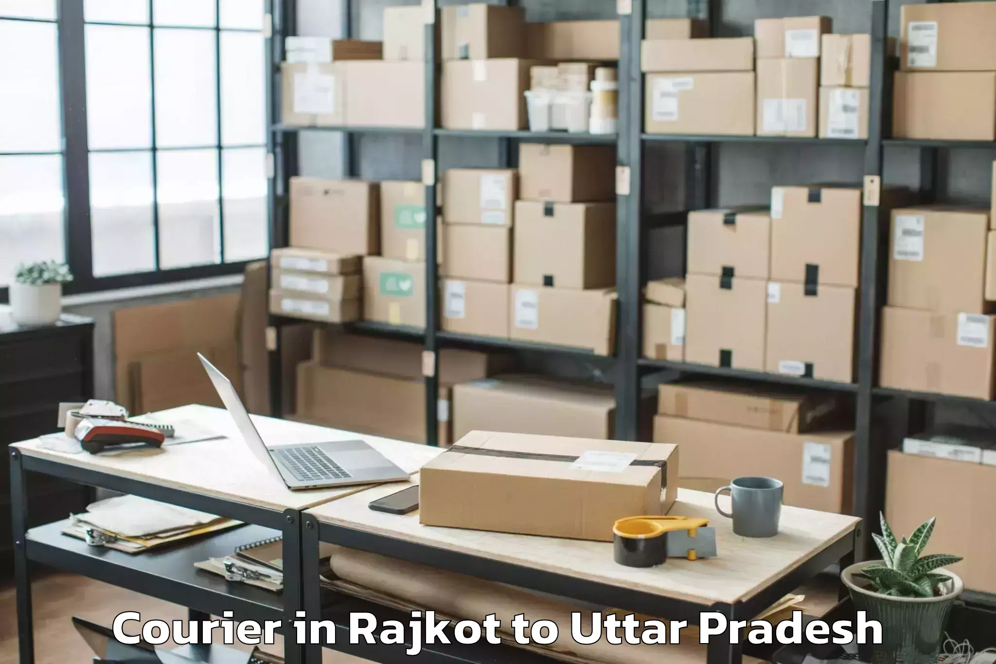 Trusted Rajkot to Dhanghata Courier